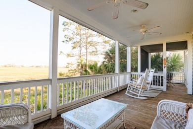 Discover your dream retreat in the prestigious Ocean Creek on Ocean Creek Golf Course in South Carolina - for sale on GolfHomes.com, golf home, golf lot
