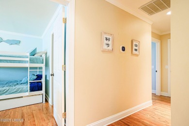 Discover your dream retreat in the prestigious Ocean Creek on Ocean Creek Golf Course in South Carolina - for sale on GolfHomes.com, golf home, golf lot
