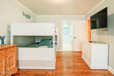 Discover your dream retreat in the prestigious Ocean Creek on Ocean Creek Golf Course in South Carolina - for sale on GolfHomes.com, golf home, golf lot