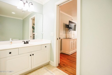 Discover your dream retreat in the prestigious Ocean Creek on Ocean Creek Golf Course in South Carolina - for sale on GolfHomes.com, golf home, golf lot