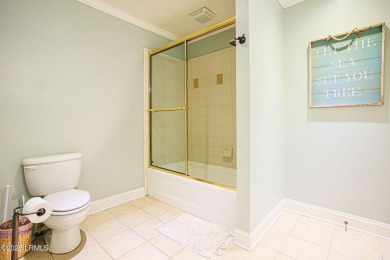 Discover your dream retreat in the prestigious Ocean Creek on Ocean Creek Golf Course in South Carolina - for sale on GolfHomes.com, golf home, golf lot