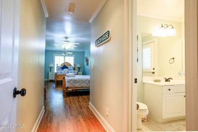Discover your dream retreat in the prestigious Ocean Creek on Ocean Creek Golf Course in South Carolina - for sale on GolfHomes.com, golf home, golf lot