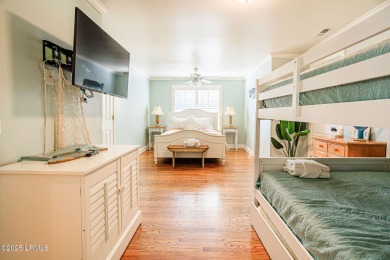 Discover your dream retreat in the prestigious Ocean Creek on Ocean Creek Golf Course in South Carolina - for sale on GolfHomes.com, golf home, golf lot