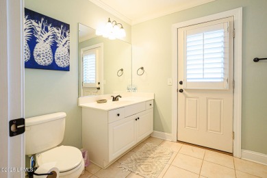 Discover your dream retreat in the prestigious Ocean Creek on Ocean Creek Golf Course in South Carolina - for sale on GolfHomes.com, golf home, golf lot