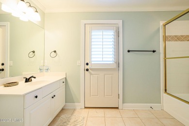 Discover your dream retreat in the prestigious Ocean Creek on Ocean Creek Golf Course in South Carolina - for sale on GolfHomes.com, golf home, golf lot