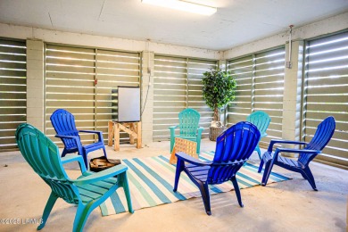 Discover your dream retreat in the prestigious Ocean Creek on Ocean Creek Golf Course in South Carolina - for sale on GolfHomes.com, golf home, golf lot