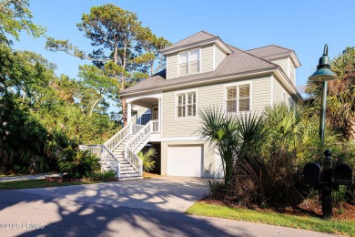 Discover your dream retreat in the prestigious Ocean Creek on Ocean Creek Golf Course in South Carolina - for sale on GolfHomes.com, golf home, golf lot