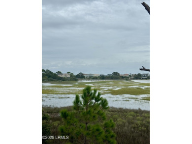 Discover your dream retreat in the prestigious Ocean Creek on Ocean Creek Golf Course in South Carolina - for sale on GolfHomes.com, golf home, golf lot