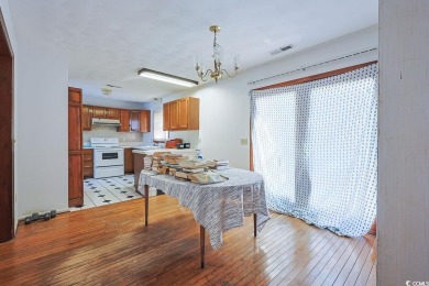 Southern Charm by the Sea! Welcome to 5704 N Kings Highway, a on Whispering Pines in South Carolina - for sale on GolfHomes.com, golf home, golf lot