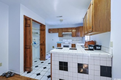 Southern Charm by the Sea! Welcome to 5704 N Kings Highway, a on Whispering Pines in South Carolina - for sale on GolfHomes.com, golf home, golf lot