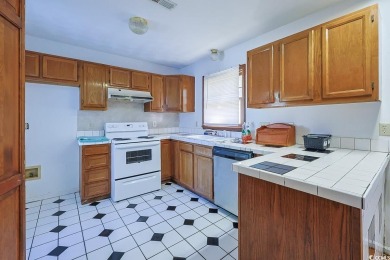 Southern Charm by the Sea! Welcome to 5704 N Kings Highway, a on Whispering Pines in South Carolina - for sale on GolfHomes.com, golf home, golf lot