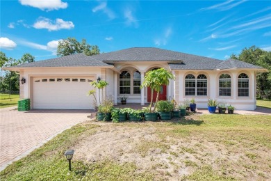 Welcome to your dream home! Nestled on a full acre of land in a on Wedgefield Golf Club in Florida - for sale on GolfHomes.com, golf home, golf lot