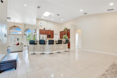 Welcome to your dream home! Nestled on a full acre of land in a on Wedgefield Golf Club in Florida - for sale on GolfHomes.com, golf home, golf lot
