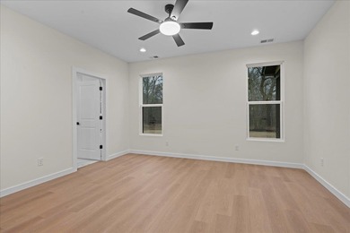 You can't miss this eye-catching new build right off Highway 357 on Woodfin Ridge Golf Club in South Carolina - for sale on GolfHomes.com, golf home, golf lot