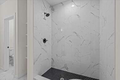 You can't miss this eye-catching new build right off Highway 357 on Woodfin Ridge Golf Club in South Carolina - for sale on GolfHomes.com, golf home, golf lot