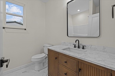 You can't miss this eye-catching new build right off Highway 357 on Woodfin Ridge Golf Club in South Carolina - for sale on GolfHomes.com, golf home, golf lot