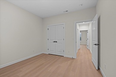 You can't miss this eye-catching new build right off Highway 357 on Woodfin Ridge Golf Club in South Carolina - for sale on GolfHomes.com, golf home, golf lot