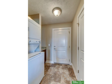 Ryan Renner, M: , ryan.renner,   - This low-maintenance townhome on Bay Hills Golf Club in Nebraska - for sale on GolfHomes.com, golf home, golf lot