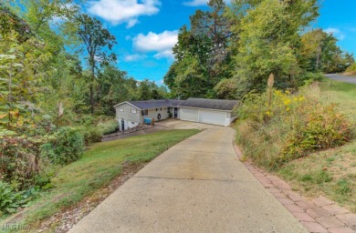 This cozy ranch at Lake Mohawk offers 3 bedrooms and 1.5 baths on Lake Mohawk Golf Club in Ohio - for sale on GolfHomes.com, golf home, golf lot