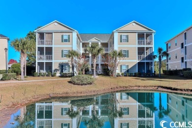 This stunning 2-bedroom, 2-bathroom end unit, pond view condo at on Wicked Stick Golf Links in South Carolina - for sale on GolfHomes.com, golf home, golf lot