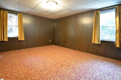 Call Listing agent Terri DeLisle  for questions and showings on Greenville Country Club in South Carolina - for sale on GolfHomes.com, golf home, golf lot