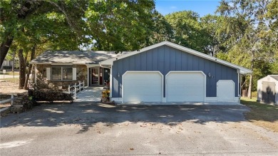 Welcome to your new home in the heart of the beautiful City of on Holiday Island Executive Golf Course in Arkansas - for sale on GolfHomes.com, golf home, golf lot