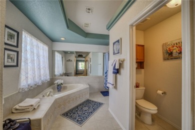 Welcome to your waterfront retreat in the highly sought-after on Los Lagos Golf Club in Arizona - for sale on GolfHomes.com, golf home, golf lot