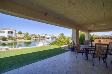 Welcome to your waterfront retreat in the highly sought-after on Los Lagos Golf Club in Arizona - for sale on GolfHomes.com, golf home, golf lot