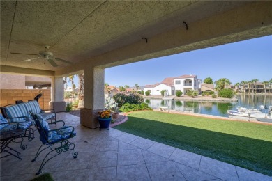 Welcome to your waterfront retreat in the highly sought-after on Los Lagos Golf Club in Arizona - for sale on GolfHomes.com, golf home, golf lot