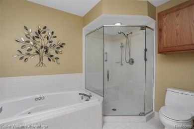 Beautifully maintained end-unit condo located on a cul-de-sac in on Beacon Hill Golf Club in Michigan - for sale on GolfHomes.com, golf home, golf lot