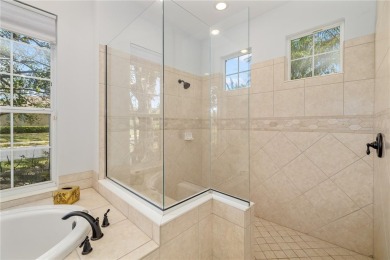 Discover this stunning 4-bedroom, 3-bathroom Neal Built home on University Park Country Club in Florida - for sale on GolfHomes.com, golf home, golf lot
