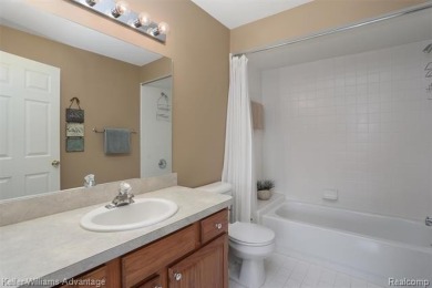 Beautifully maintained end-unit condo located on a cul-de-sac in on Beacon Hill Golf Club in Michigan - for sale on GolfHomes.com, golf home, golf lot