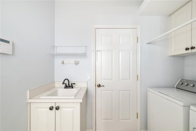 Discover this stunning 4-bedroom, 3-bathroom Neal Built home on University Park Country Club in Florida - for sale on GolfHomes.com, golf home, golf lot