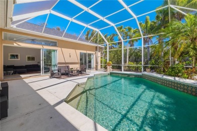 Discover this stunning 4-bedroom, 3-bathroom Neal Built home on University Park Country Club in Florida - for sale on GolfHomes.com, golf home, golf lot