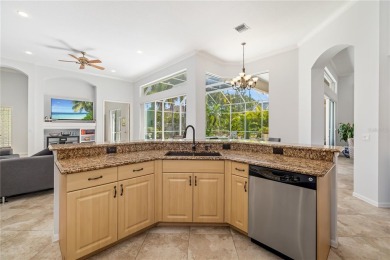 Discover this stunning 4-bedroom, 3-bathroom Neal Built home on University Park Country Club in Florida - for sale on GolfHomes.com, golf home, golf lot