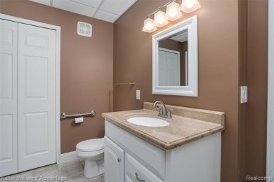 Beautifully maintained end-unit condo located on a cul-de-sac in on Beacon Hill Golf Club in Michigan - for sale on GolfHomes.com, golf home, golf lot
