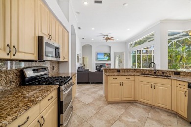 Discover this stunning 4-bedroom, 3-bathroom Neal Built home on University Park Country Club in Florida - for sale on GolfHomes.com, golf home, golf lot