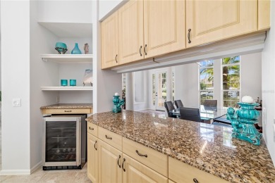 Discover this stunning 4-bedroom, 3-bathroom Neal Built home on University Park Country Club in Florida - for sale on GolfHomes.com, golf home, golf lot