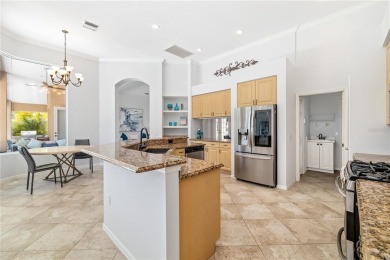 Discover this stunning 4-bedroom, 3-bathroom Neal Built home on University Park Country Club in Florida - for sale on GolfHomes.com, golf home, golf lot