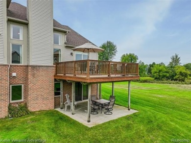 Beautifully maintained end-unit condo located on a cul-de-sac in on Beacon Hill Golf Club in Michigan - for sale on GolfHomes.com, golf home, golf lot