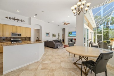 Discover this stunning 4-bedroom, 3-bathroom Neal Built home on University Park Country Club in Florida - for sale on GolfHomes.com, golf home, golf lot