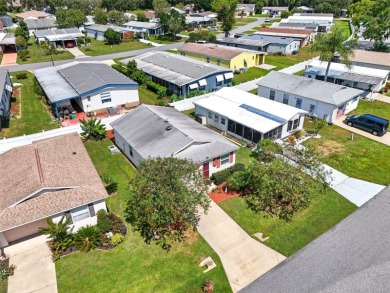 Own this beautifully maintained cottage style home perfect for on Pennbrooke Fairways in Florida - for sale on GolfHomes.com, golf home, golf lot