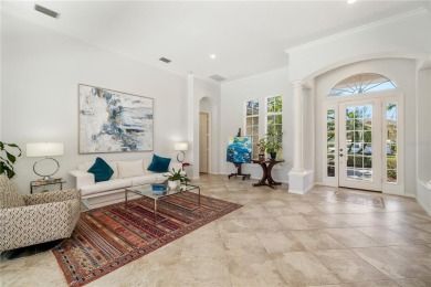 Discover this stunning 4-bedroom, 3-bathroom Neal Built home on University Park Country Club in Florida - for sale on GolfHomes.com, golf home, golf lot