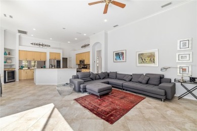 Discover this stunning 4-bedroom, 3-bathroom Neal Built home on University Park Country Club in Florida - for sale on GolfHomes.com, golf home, golf lot