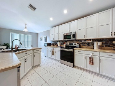 Welcome to this stunning 4-bedroom, 2-bathroom home boasting 2 on The Links of Lake Bernadette in Florida - for sale on GolfHomes.com, golf home, golf lot