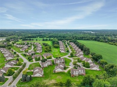 Beautifully maintained end-unit condo located on a cul-de-sac in on Beacon Hill Golf Club in Michigan - for sale on GolfHomes.com, golf home, golf lot