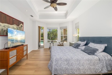 Discover this stunning 4-bedroom, 3-bathroom Neal Built home on University Park Country Club in Florida - for sale on GolfHomes.com, golf home, golf lot