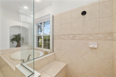 Discover this stunning 4-bedroom, 3-bathroom Neal Built home on University Park Country Club in Florida - for sale on GolfHomes.com, golf home, golf lot
