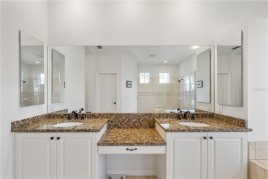 Discover this stunning 4-bedroom, 3-bathroom Neal Built home on University Park Country Club in Florida - for sale on GolfHomes.com, golf home, golf lot
