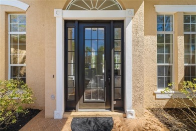 Discover this stunning 4-bedroom, 3-bathroom Neal Built home on University Park Country Club in Florida - for sale on GolfHomes.com, golf home, golf lot